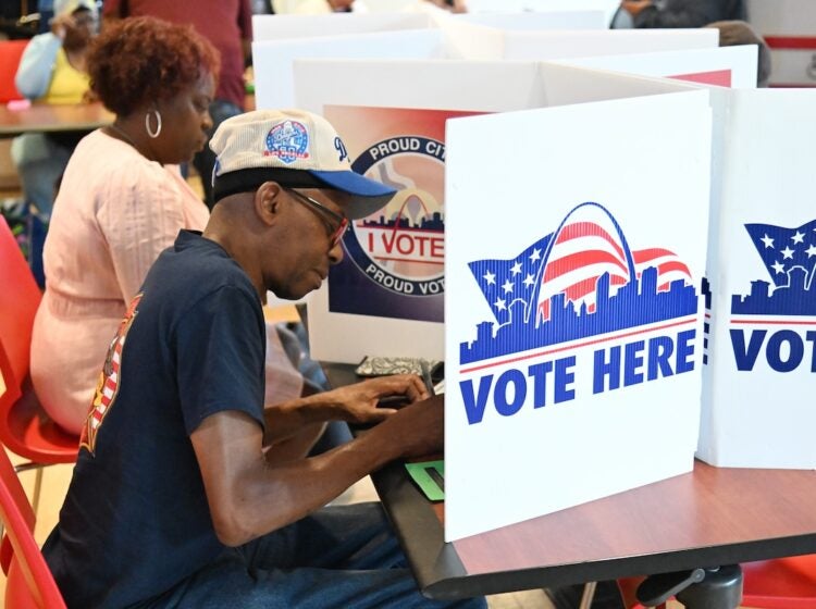 Voters cast their ballots on primary election day Tuesday, Aug. 4, 2026, in St. Louis. (AP Photo/Michael Thomas)