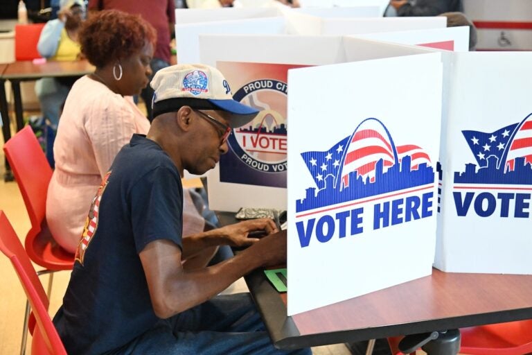 Voters cast their ballots on primary election day Tuesday, Aug. 4, 2026, in St. Louis. (AP Photo/Michael Thomas)