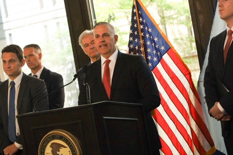 Scott Brady speaks at a podium