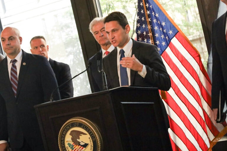 David Metcalf speaks at a podium