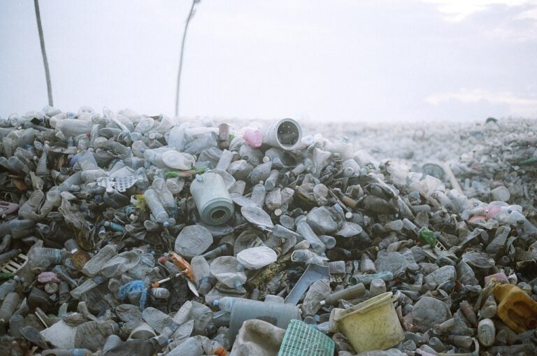 Piles of plastic waste outside.
