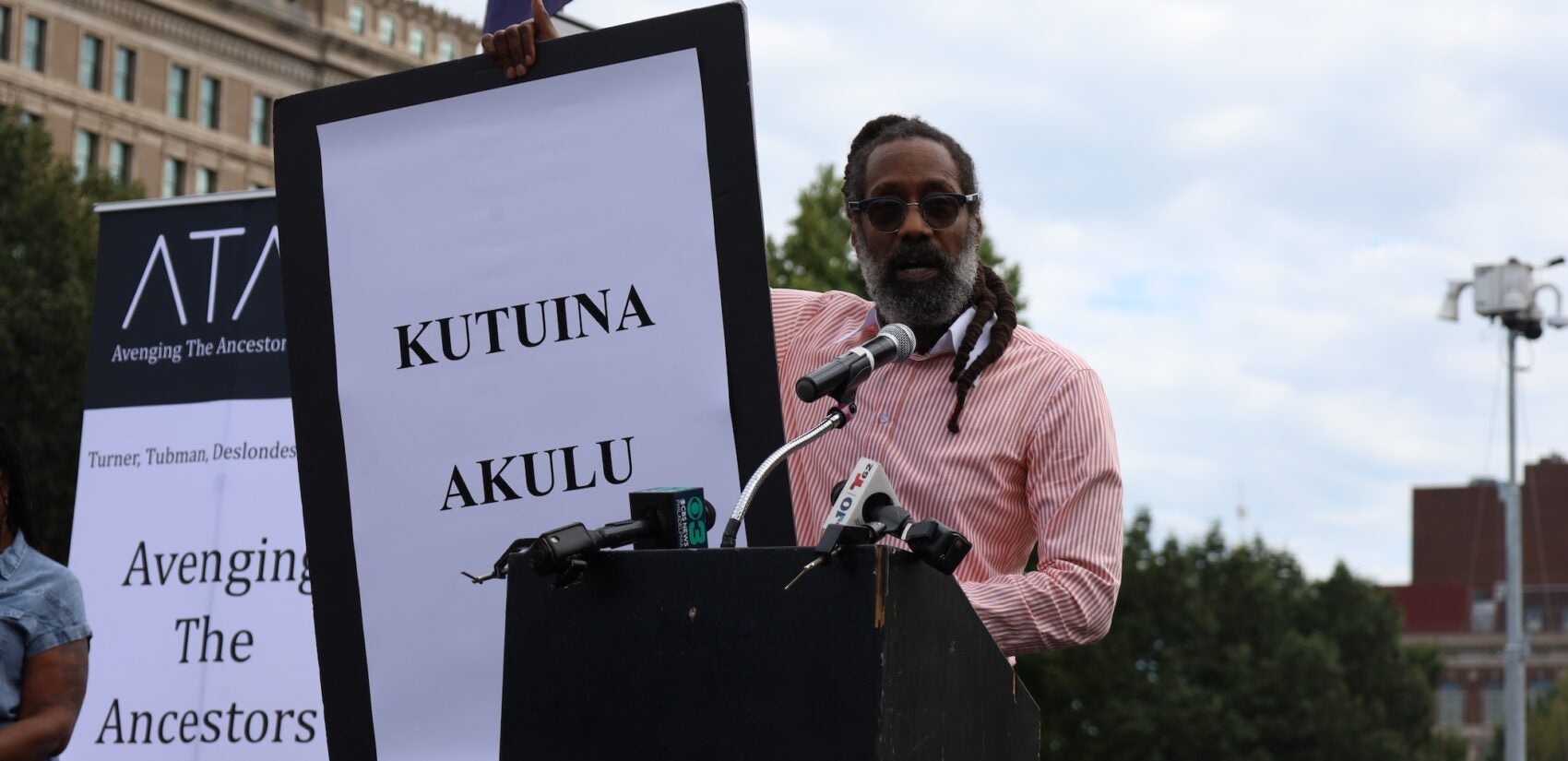Michael Coard addresses the crowd at the President's House site.