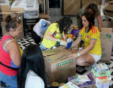 colombia-earthquake-relief-philadelphia-10 A group of women prepare packages to send to Colombia after an earthquake killed hundreds and injured thousands more