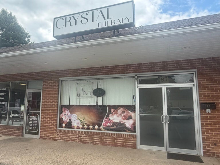 The storefront of the Crystal Therapy massage parlor in New Castle County, Delaware