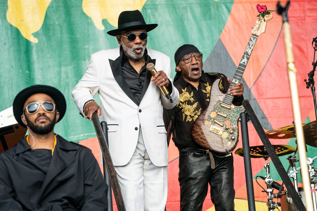 Ronald Isley and Ernie Isley of the Isley Brothers perform on stage.