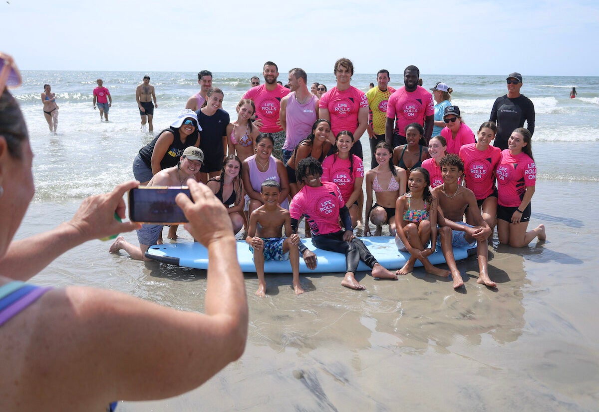 attendees pose for a photo