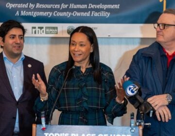 Neil Makhija, Jamila Winder and Tom DiBello at a press conference