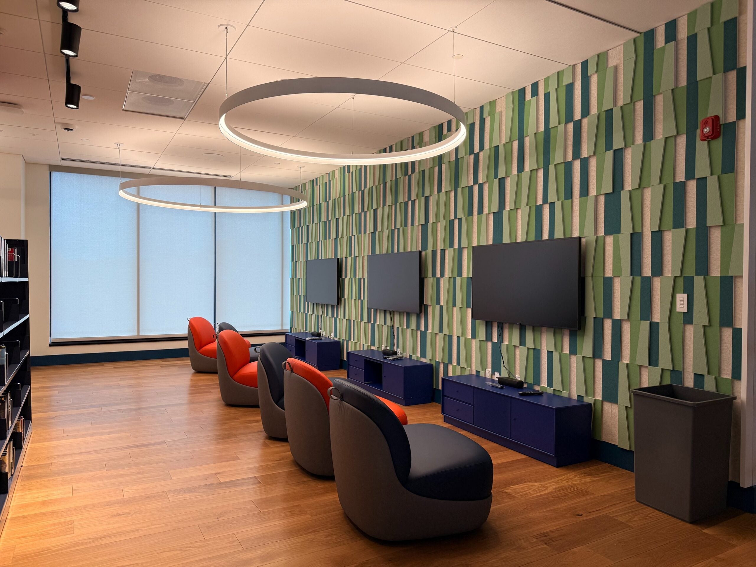 chairs and tvs in the library
