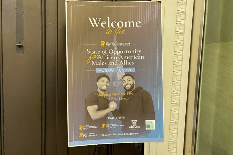 A pamphlet reads Welcome to the State of Opportunity for African American Males and Allies
