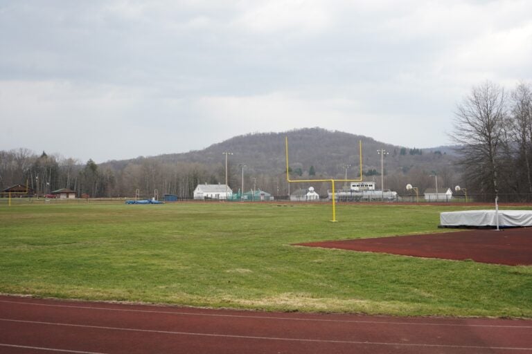 The mountainous terrain of northwest Pennsylvania are visible from the track and football field behind Otto-Eldred Jr./Sr. High School