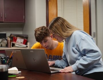 Otto-Eldred students Jack Sherry and Alexis Prince boot up their refurbished, school-issued laptops
