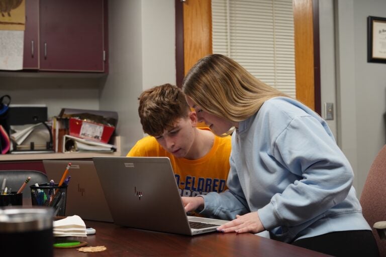 Otto-Eldred students Jack Sherry and Alexis Prince boot up their refurbished, school-issued laptops