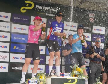 philadelphia-cycling-classic-bp-083126 Cyclists Chiara Consonni (center) Alexandra Volstad (left) and Ella Sabo pop champagne