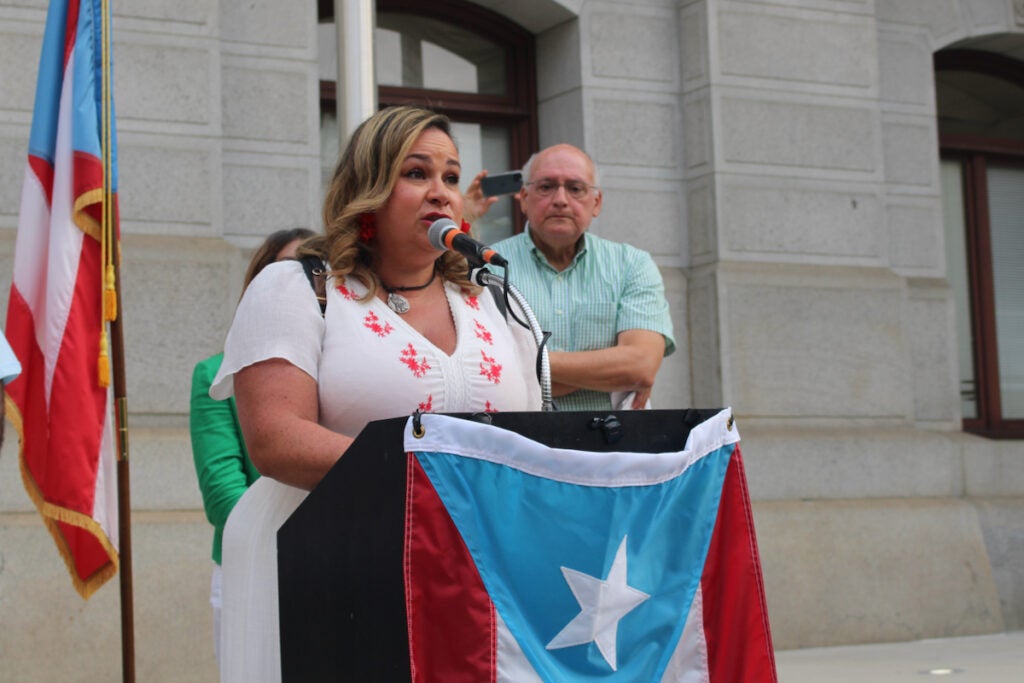 Vanessa Maria Graber, co-founder of Philly Boricuas, speaks at a rally at Philadelphia City Hall