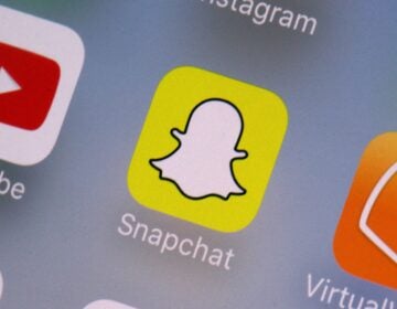 snapchat-ap-file The Snapchat app seen on a phone
