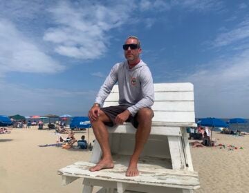 schweers-lifeguard-2026-09-03-2 Ben Schweers sits on the lifeguard chair and surveys the water making sure swimmers are safe at Rehoboth Beach, Del.