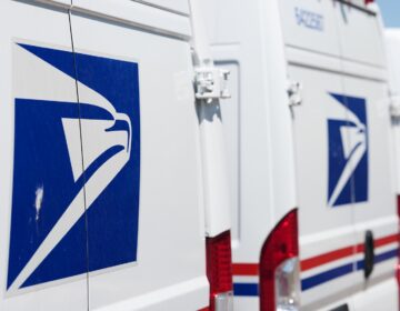 Election 2026 Postal Service Delivery vans are parked outside the main United States Postal Service headquarters in northeast Denver.