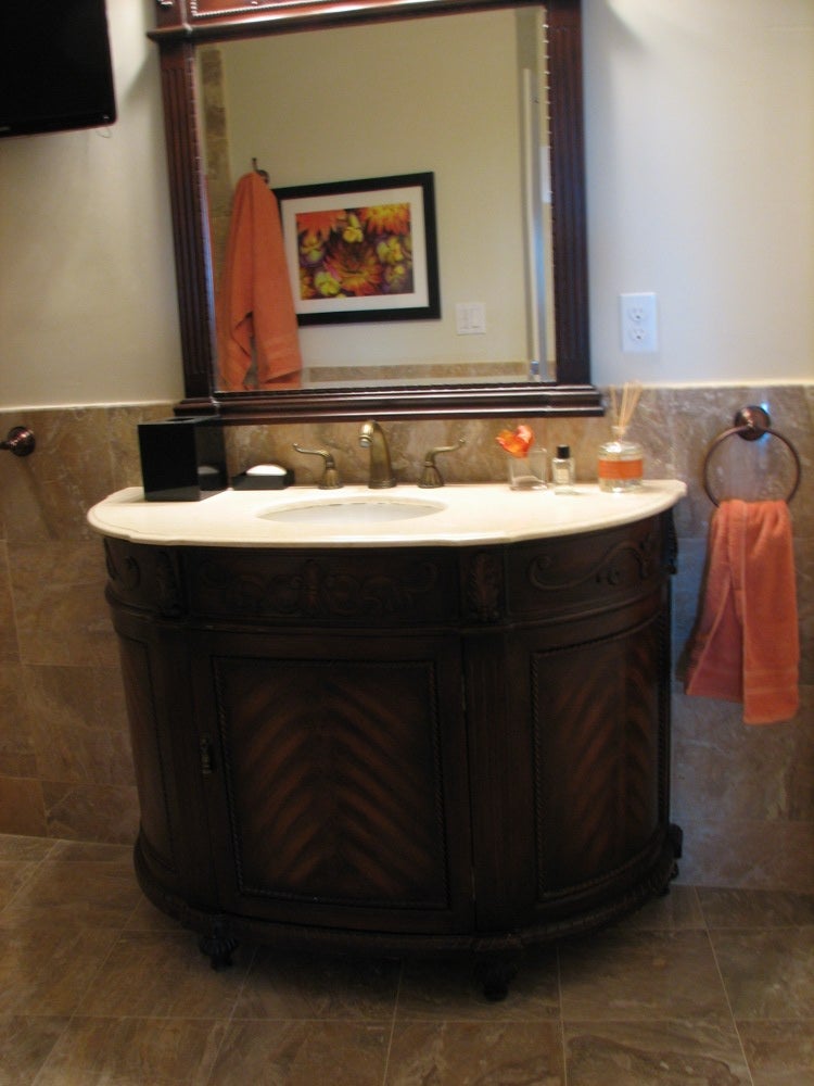 Samschick had the bathroom vanities specially designed for the space