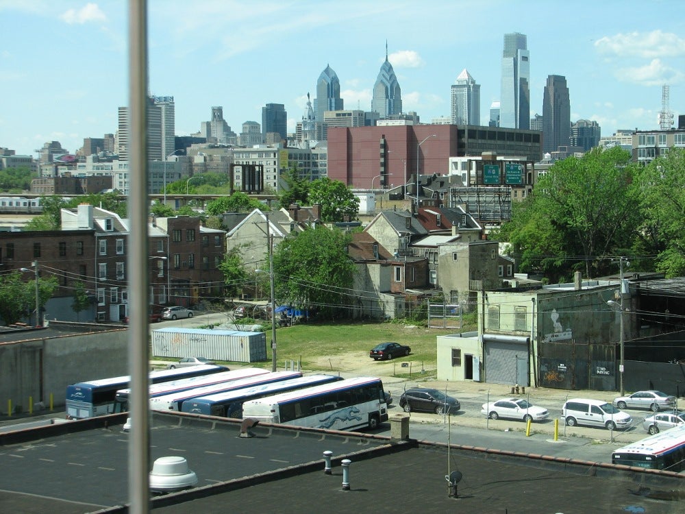 A city view from one apartment, through the window wall