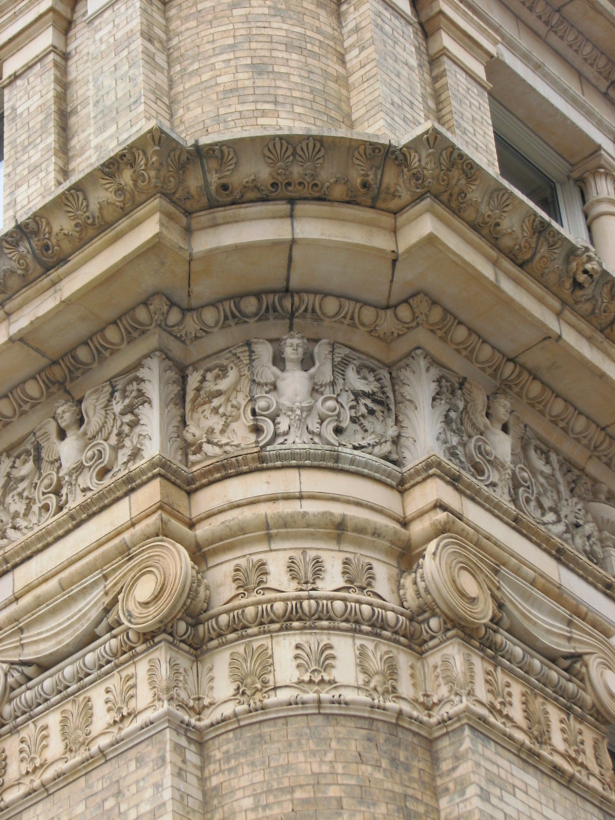 The massive building is softened by rounded corners.  