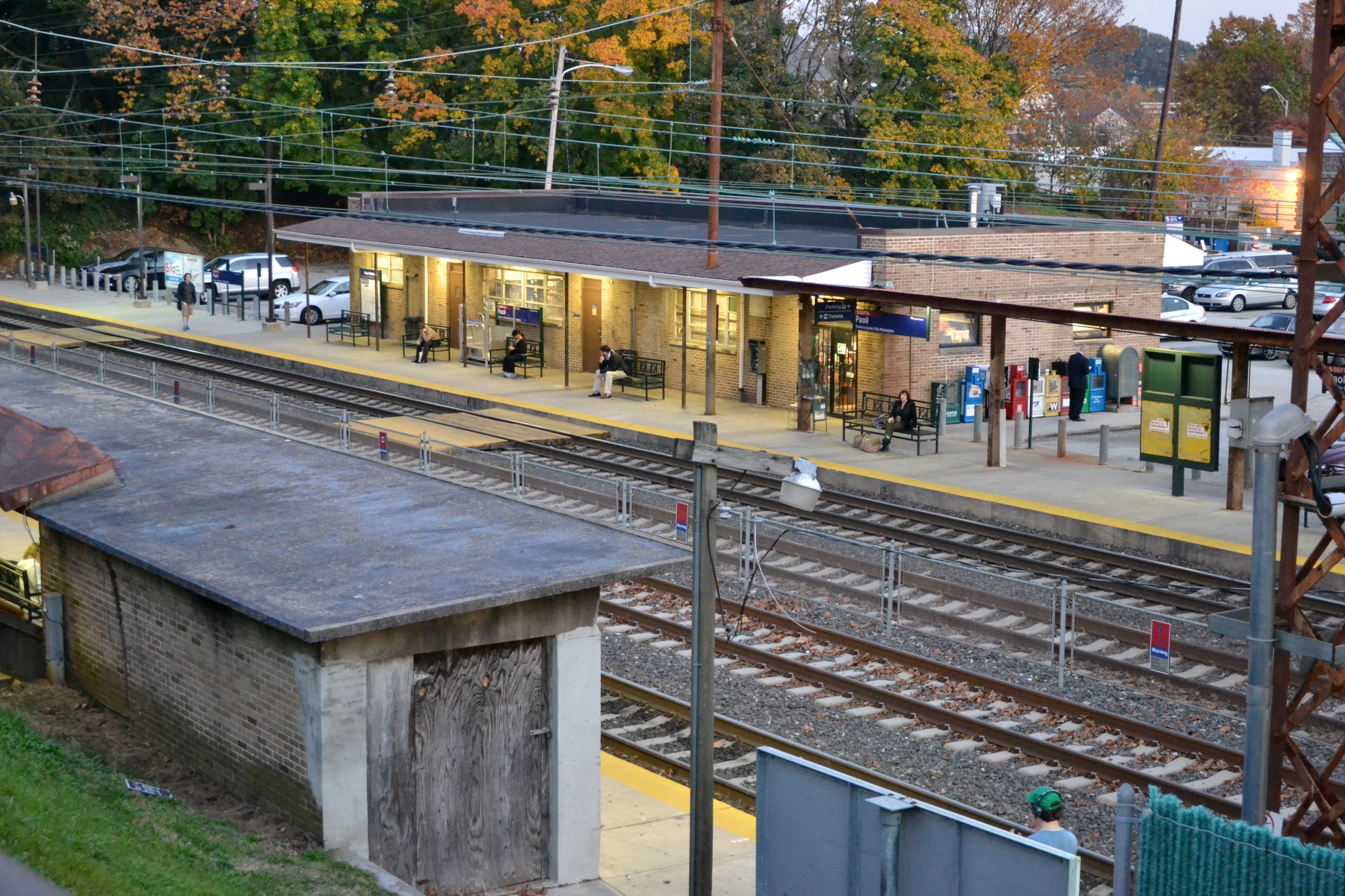 The current Paoli station is a small, outdated structure at the back of an inaccessible parking lot