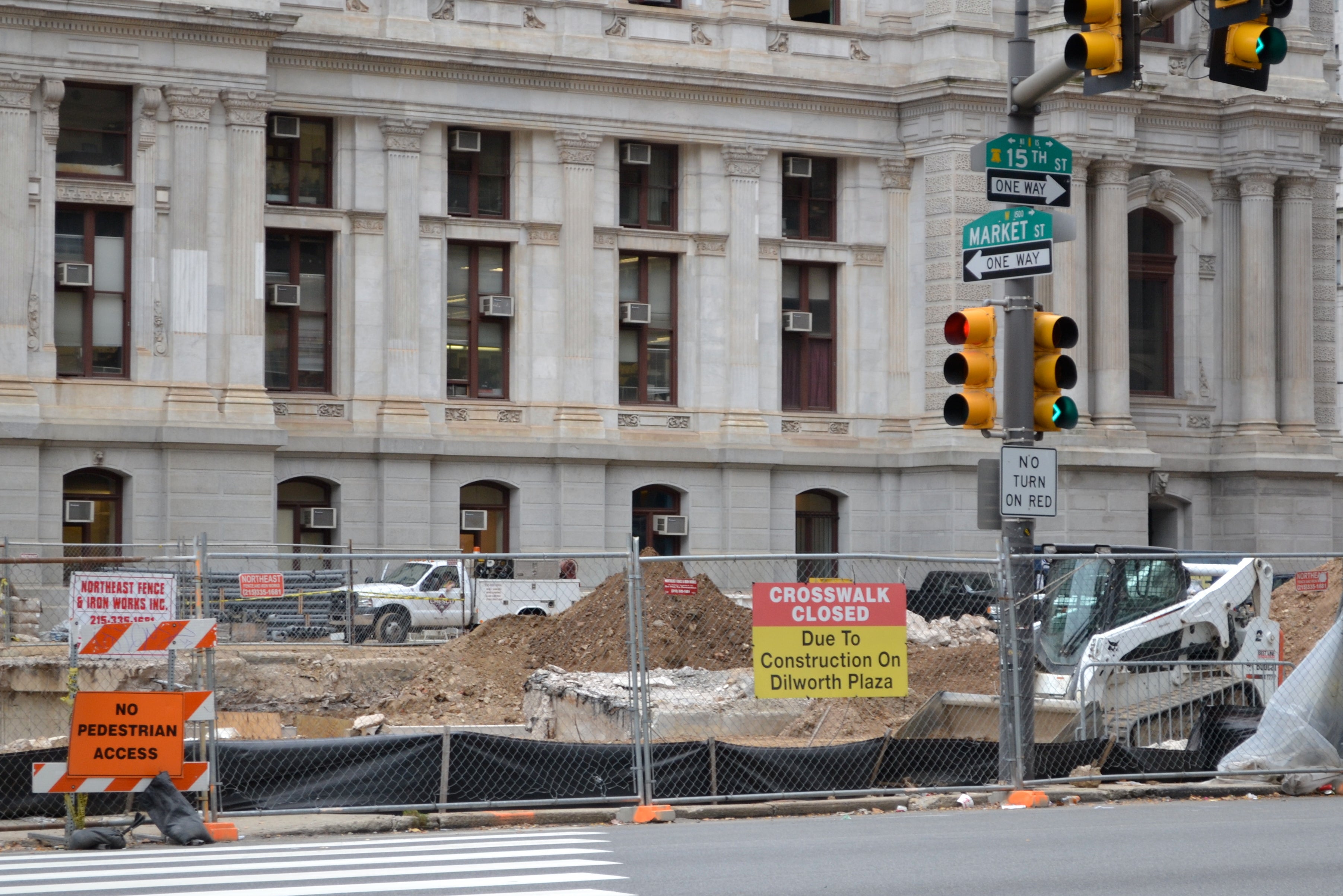 The sidewalk from west Market Street to City Hall is closed