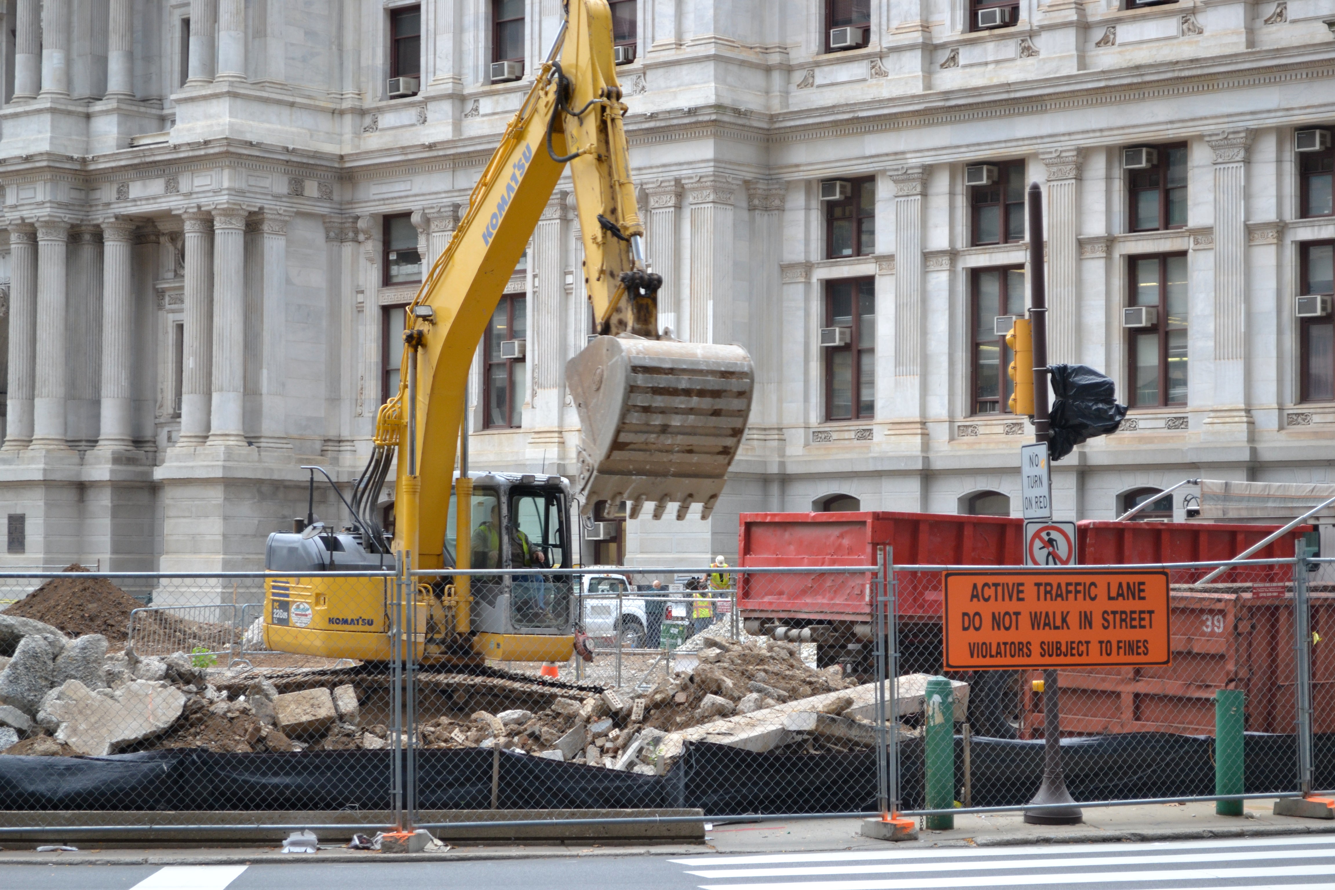 Construction work is planned right up to the curb line, making temporary sidewalks impossible