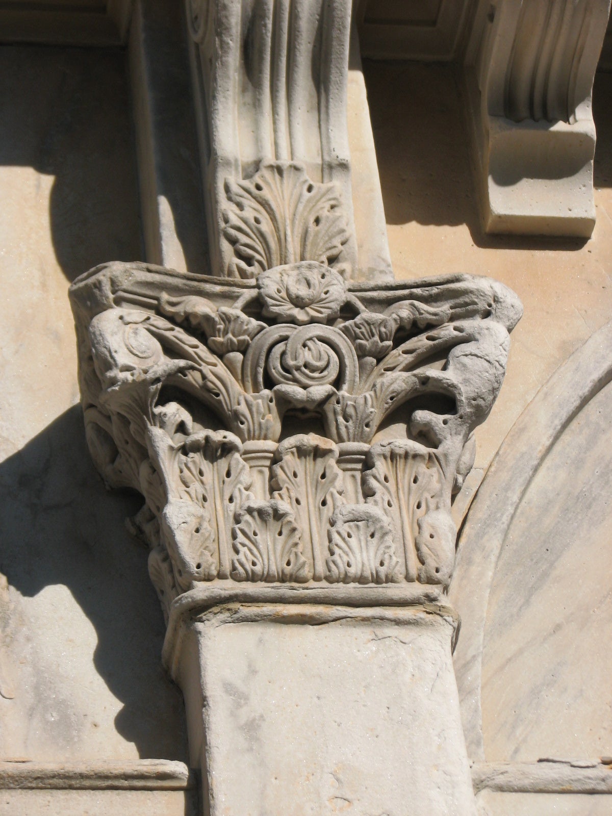 Elaborate pilasters support the portico.