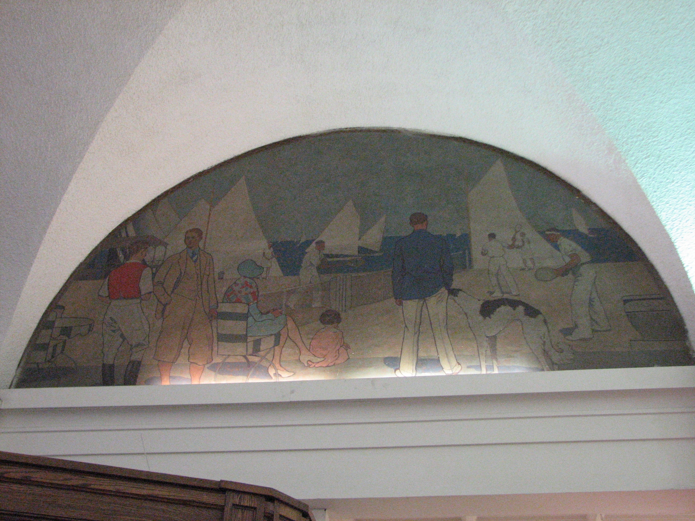 Murals of fashionably dressed young families have survived the building's many occupants.