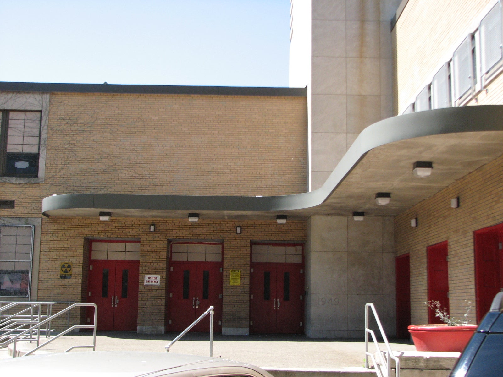 The entrance to Sayre incorporates mid-century line and curves.