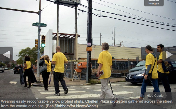 Chelten Plaza protesters gathered across the street from the construction site. (Bas Slabbers/for NewsWorks)