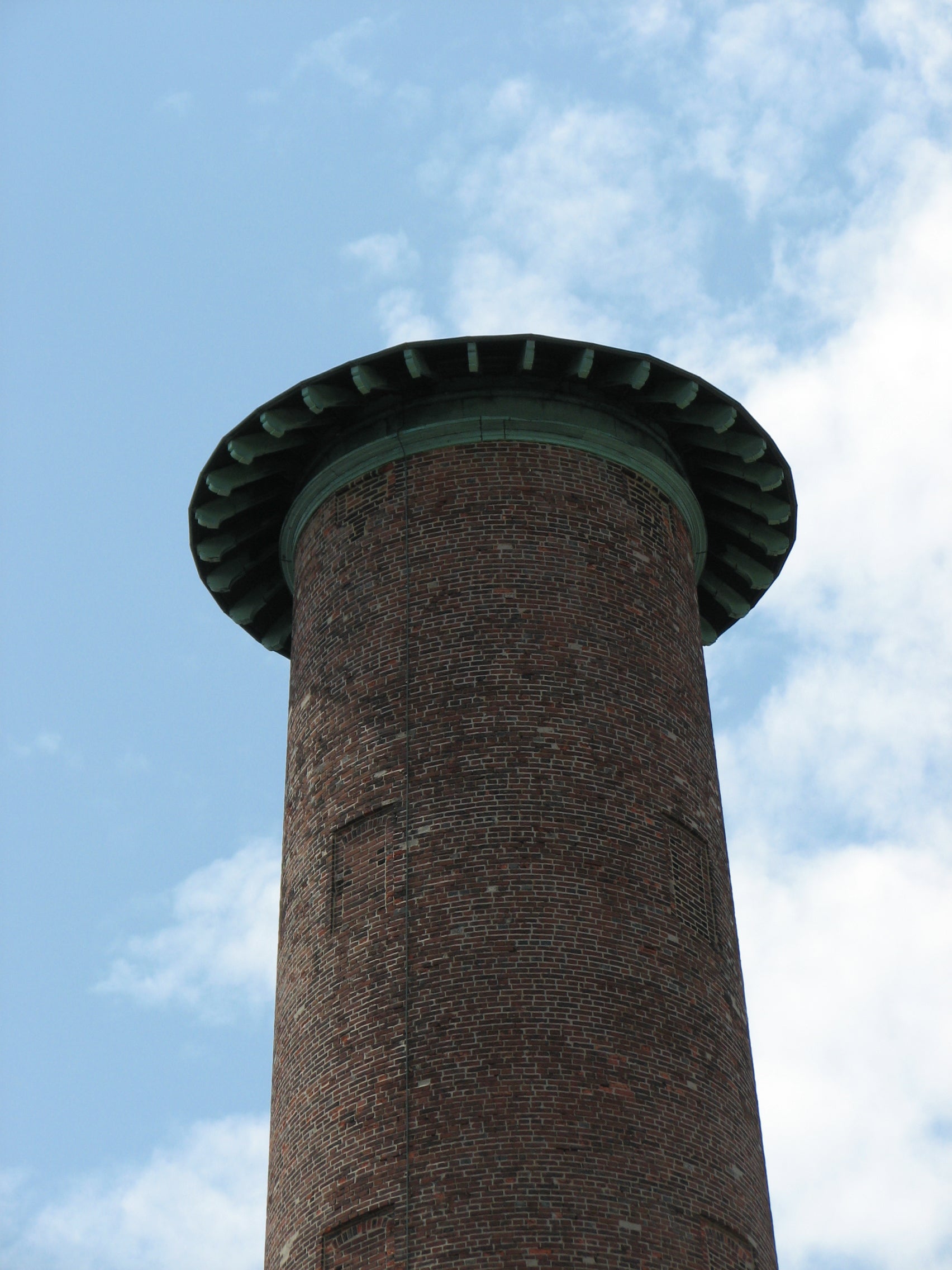 The roof was added to the tower in the 20th century, reducing its height slightly.