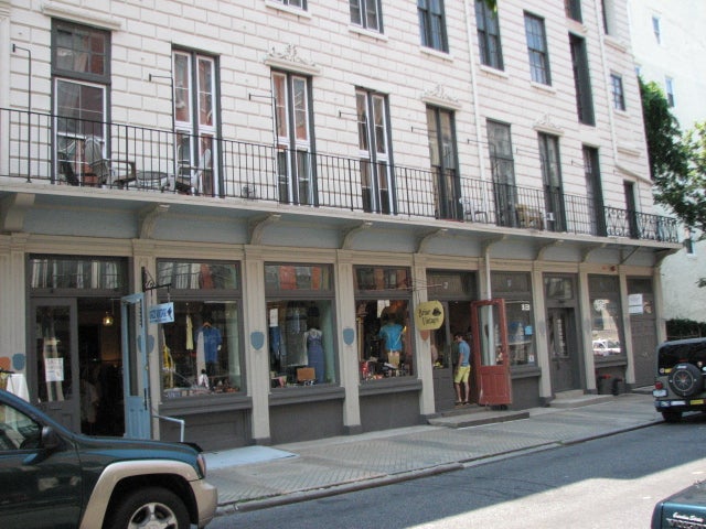 Retail businesses occupy the first level of the former hotel.