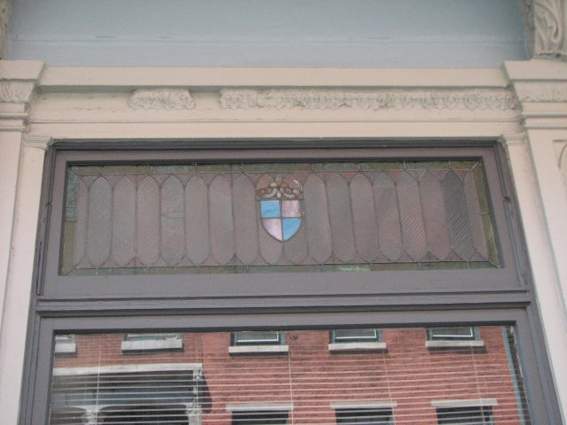 A few of the stained glass panels have survived the building's transitions.