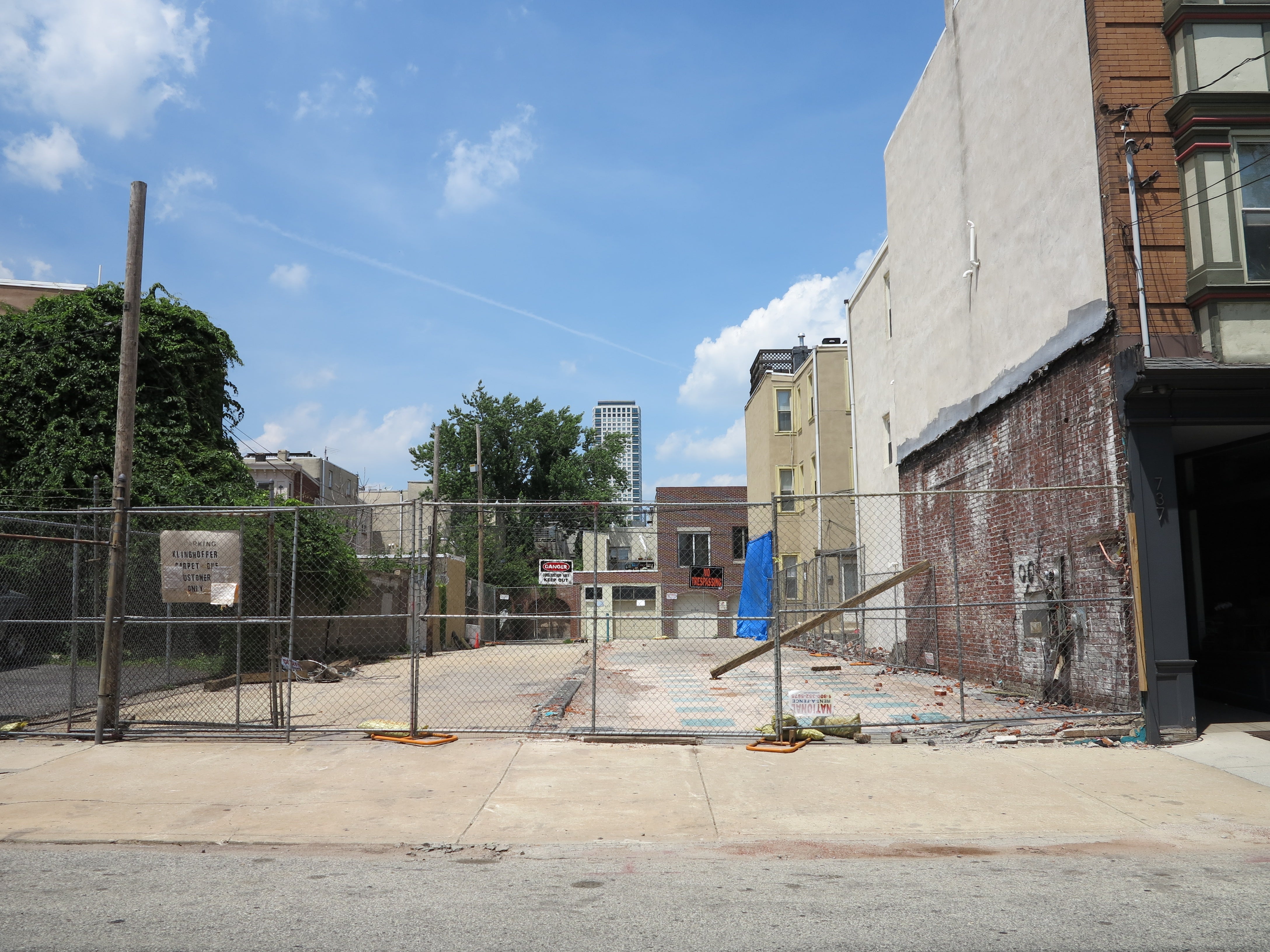 Cleared lots on 700 block of Bainbridge looking north toward Kater, slated for garage-fronted rowhouses
