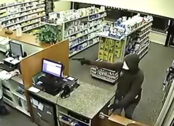 Surveillance footage of the Jan. 25 pharmacy robbery in Holme Circle. Image/Philadelphia Police