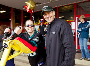 ABCOASTER competition winner Angela Radesky and RetroFitness staff member Michael Ritter at the gym's gran reopening Saturday, April 28. Photo/Michelle Alton