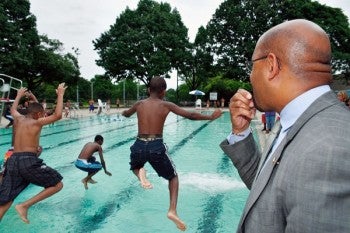 With a blow of the whistle, Mayor Michael Nutter kicks of the 2012 city pool season. NewsWorks Photo/Bas Slabbers