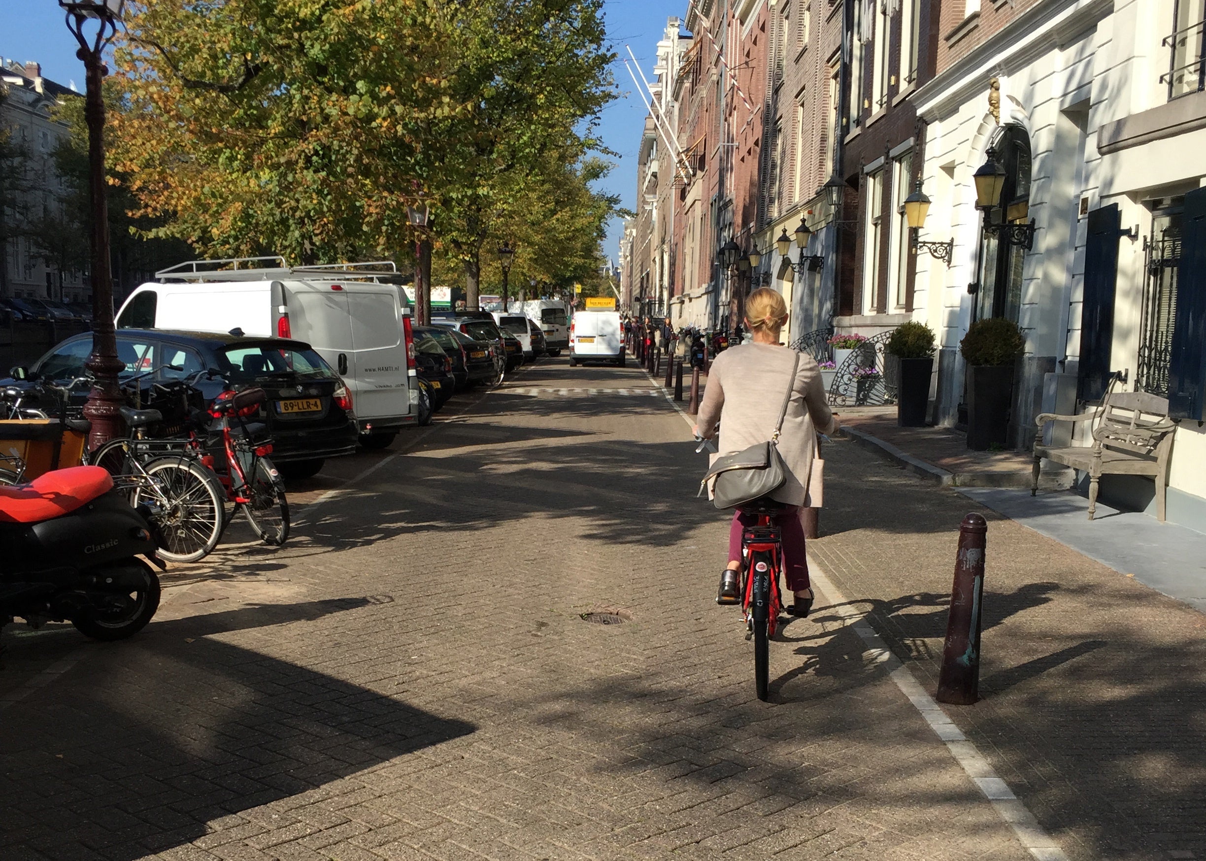 Ashley biking in Amsterdam