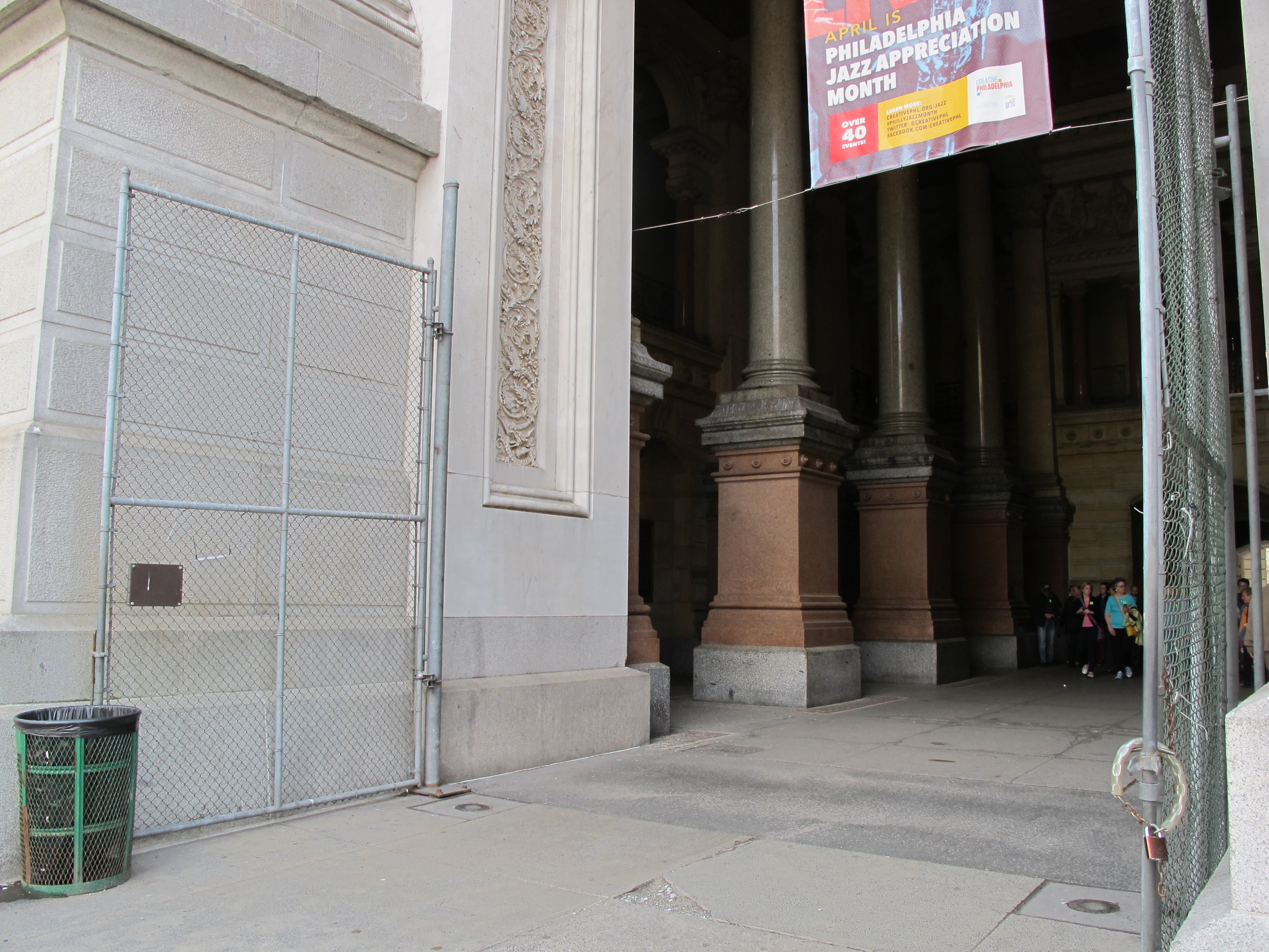 Chain link gates will be replaced using an unbuilt design for portal gates by City Hall's architect