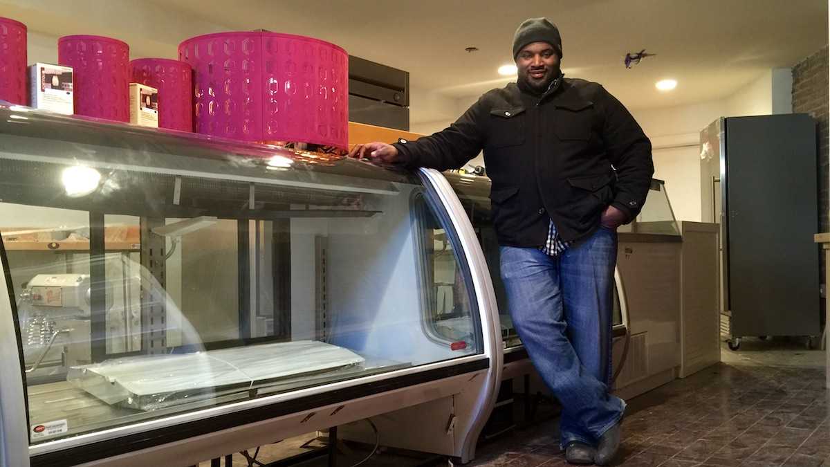 Jimmie Reed stand inside Little Jimmie's Bake House. Renovations are nearly complete and he plans to open next month. (Jana Shea/ for NewsWorks)