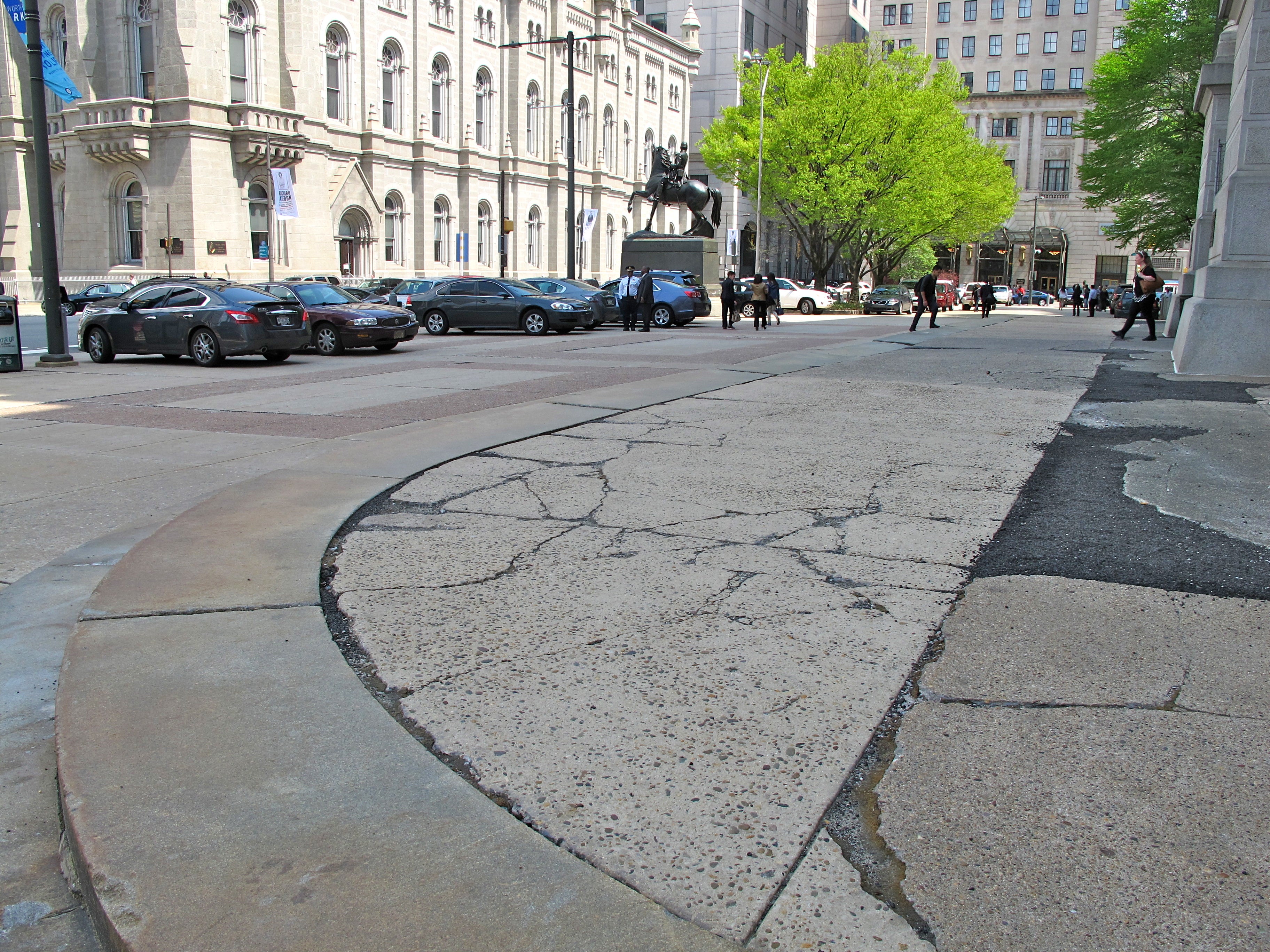 The north apron's cars and cracked concrete