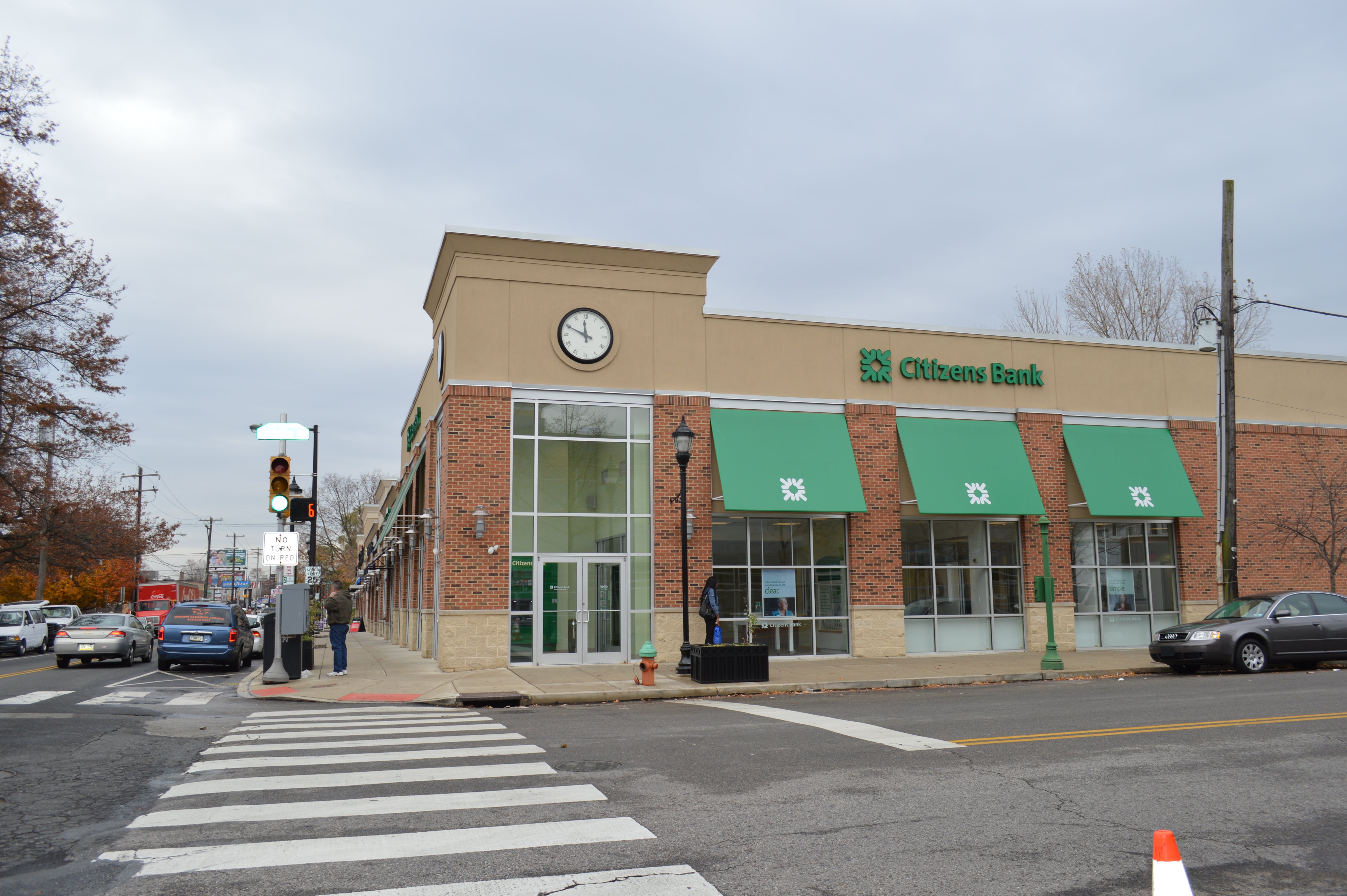 A strip mall at Ridge and Lyceum with parking in the rear constructed in 2007.