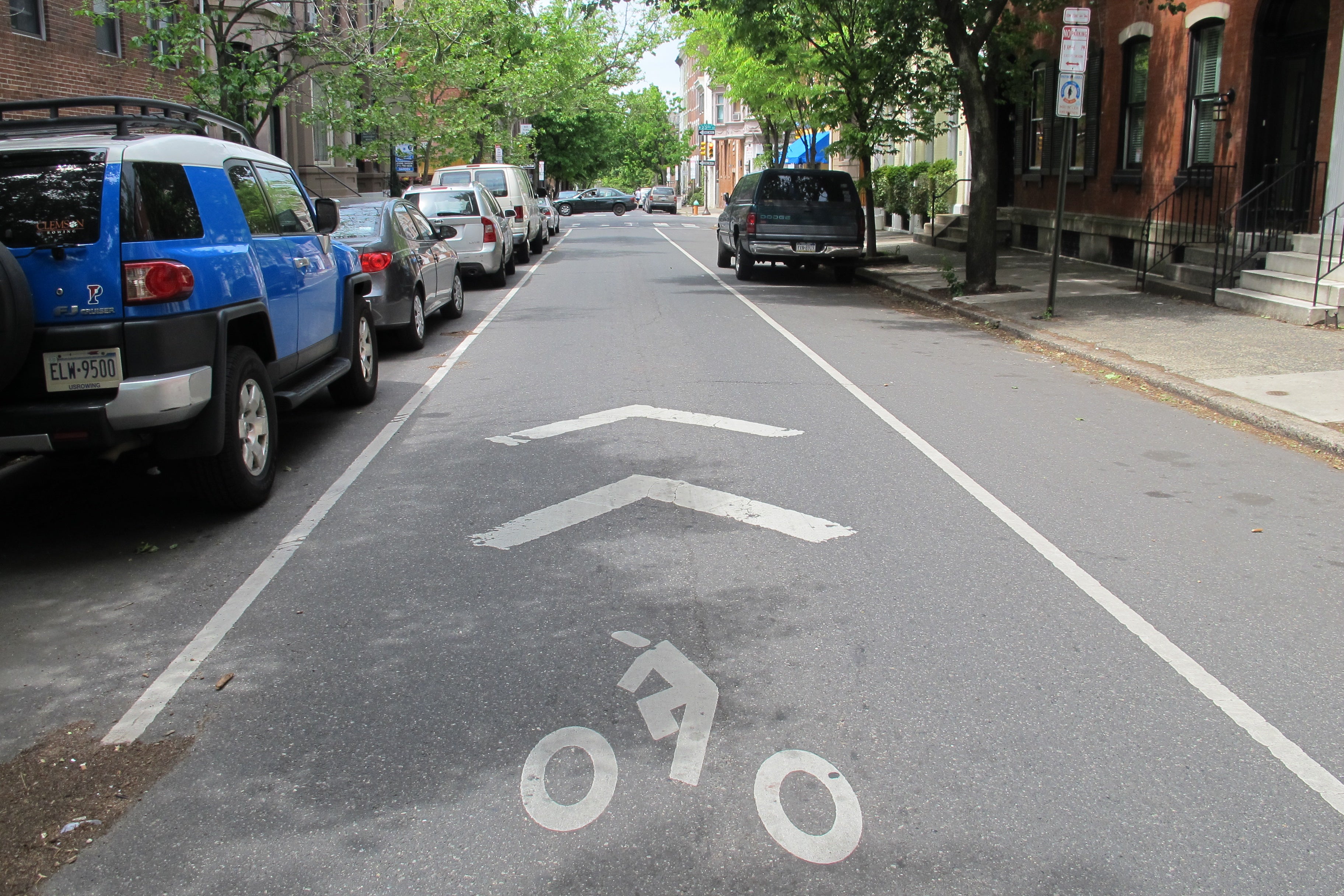 Sharrows , like this one on Spruce Street, are meant to direct bicycle traffic and instruct drivers and cyclists to share the road. Sharrows , like this one on Spruce Street, are meant to direct bicycle traffic and instruct drivers and cyclists to share the road.