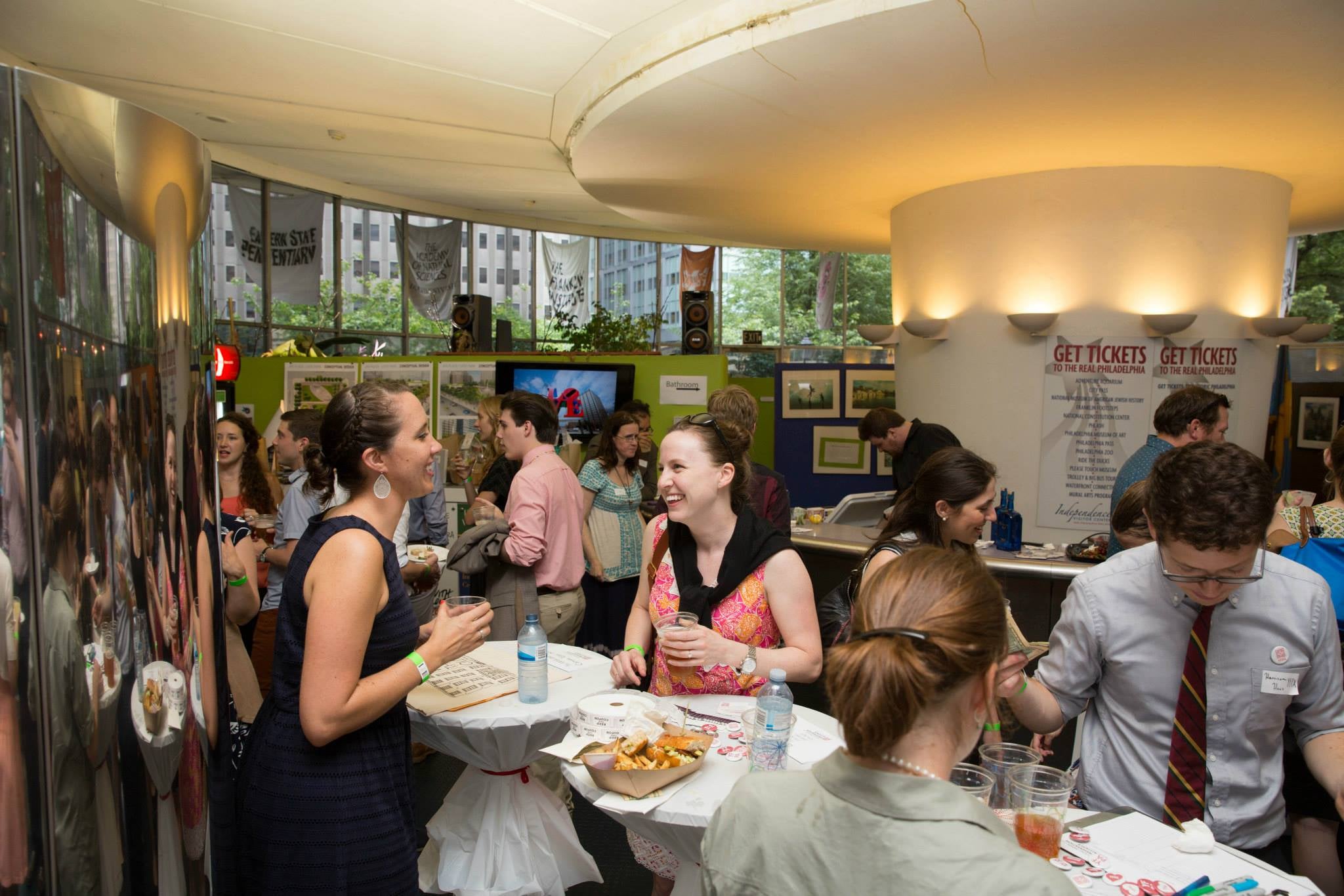 Molly Lester (left) staffing the ticket and merchandise station at the celebration for the “Save the Saucer” campaign, May 2015. | Lynn Alpert.