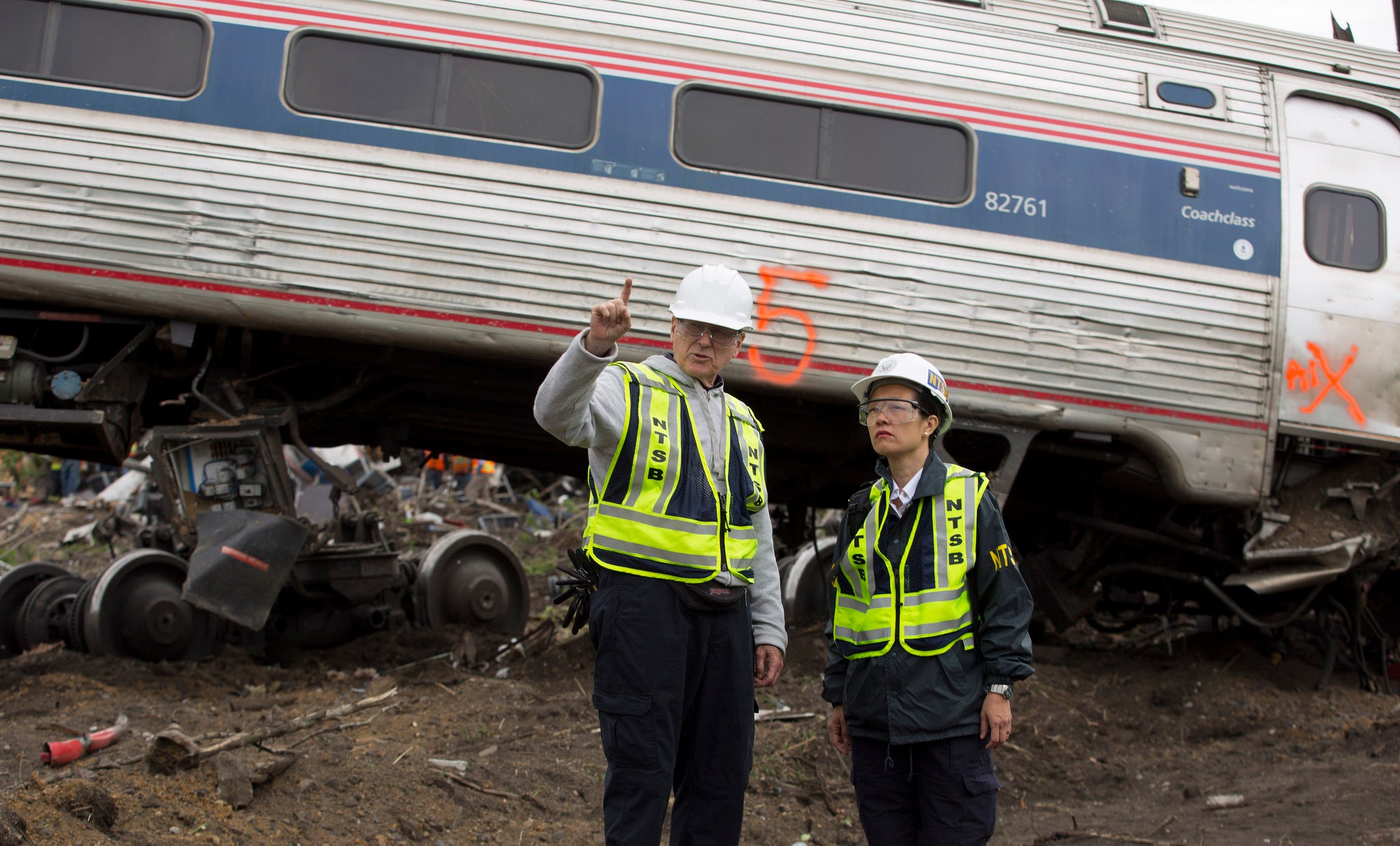 NTSB IIC Mike Flanigon briefs Vice Chairman Dinh-Zarr on the scene of the Amtrak Train #188 Derailment in Philadelphia, PA | NTSB, Creative Commons
