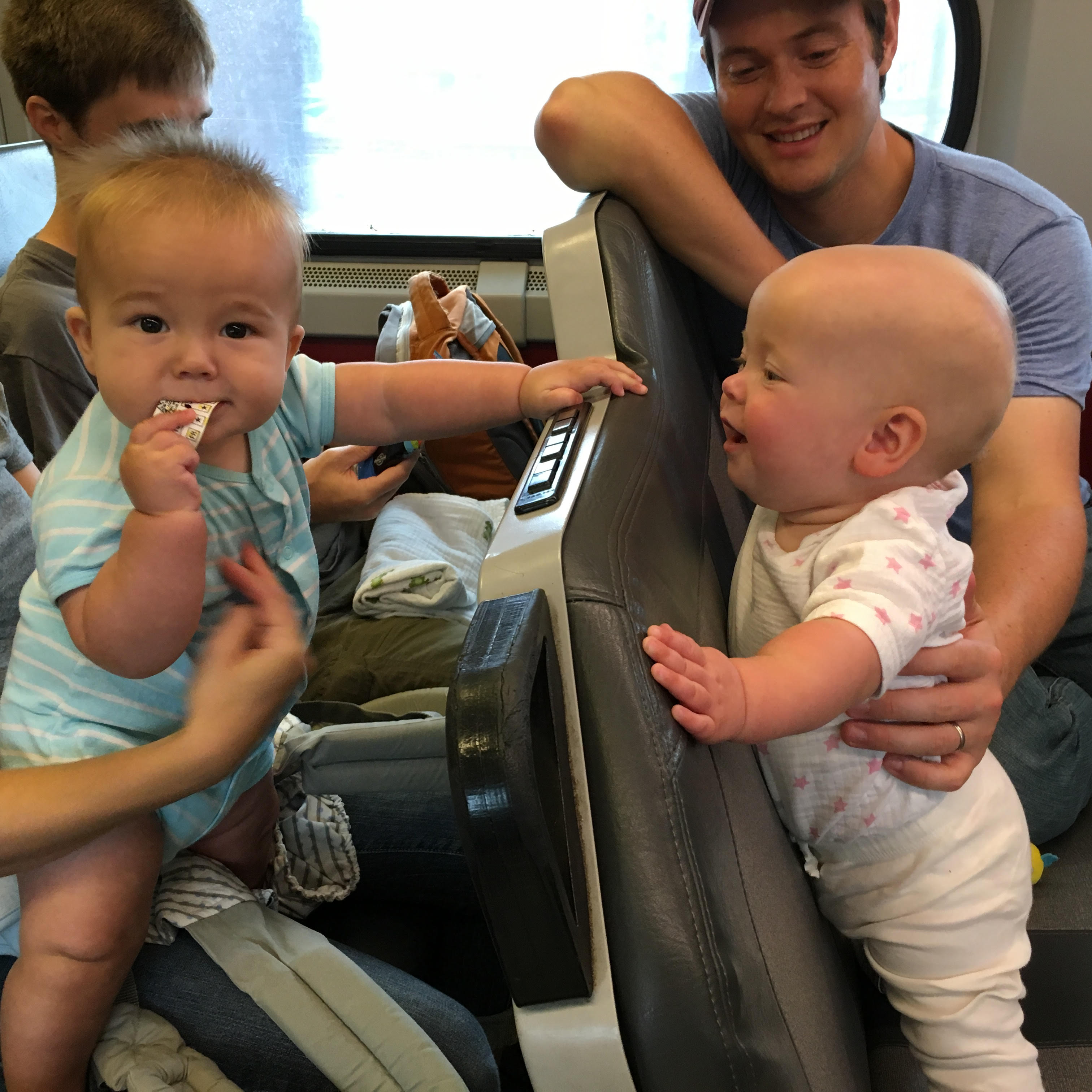 Ally Jane and Erik ride on regional rail. | courtesy of the Johansons