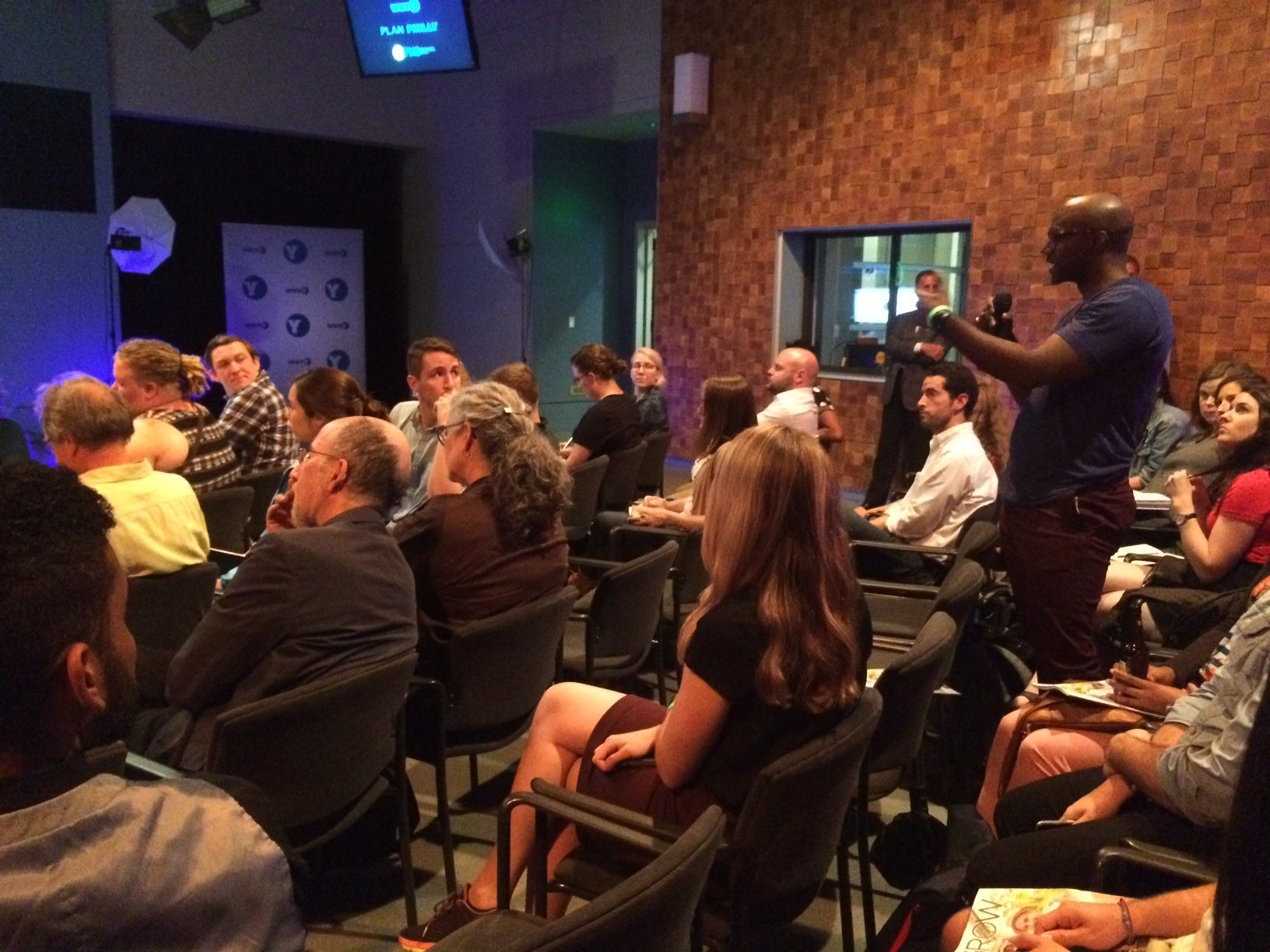 Audience member poses question to panelists. Credit: Catalina Jaramillo/WHYY