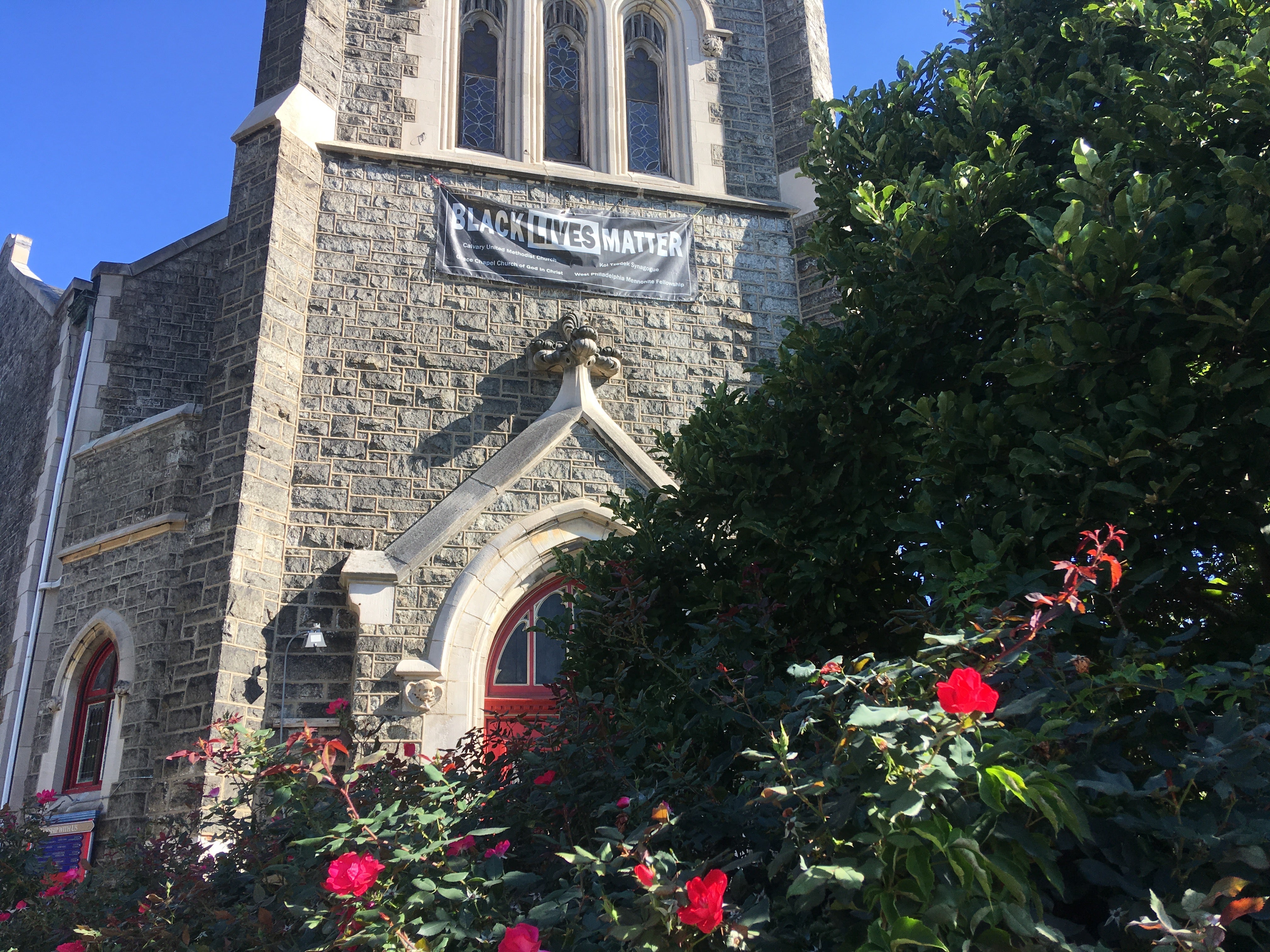 Black Lives Matter sign posted on the front of Calvary United