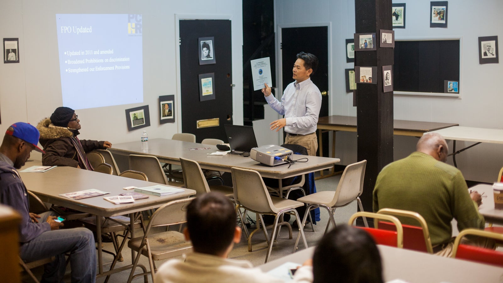 Bunrath Math of the Philaelphia Comission on Human Relations hosts a Civic Engagement Academy to connect neighborhoods to services. (Brad Larrison for NewsWorks)